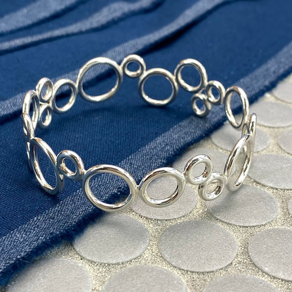 Annulet Flowing Circles Bangle
