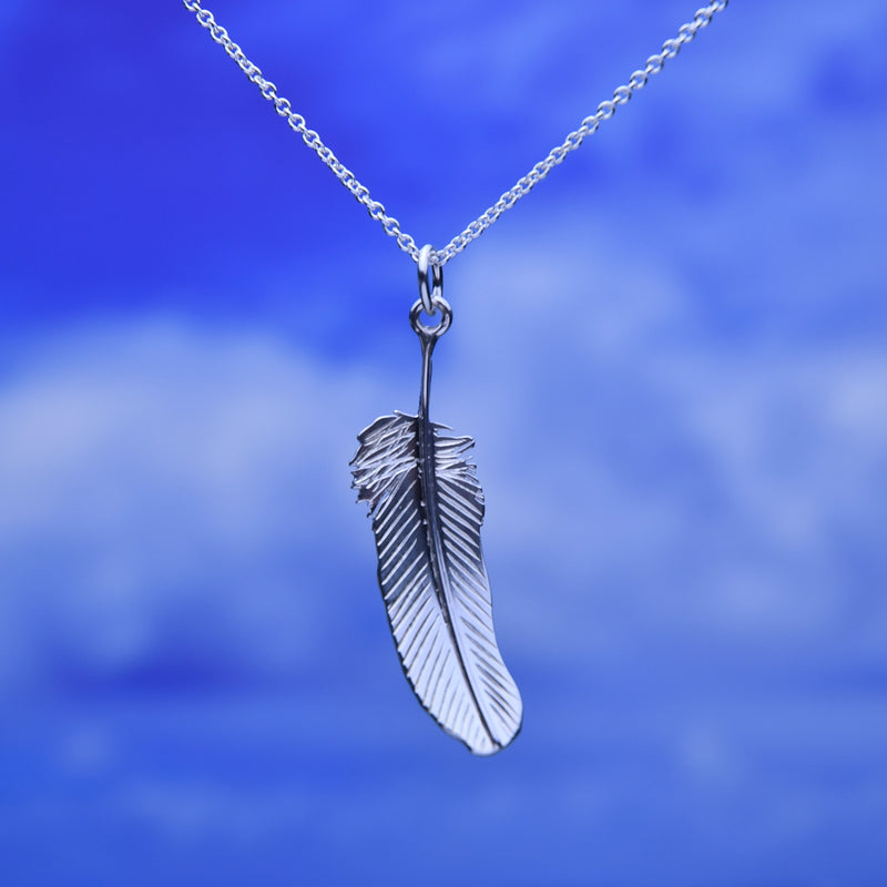 Carved Feather Pendant
